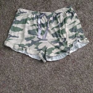 tan and green baggy camo shorts